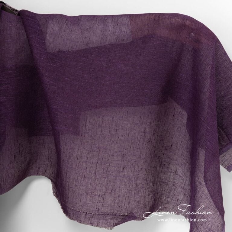 Transparent linen fabric in eggplant colour.