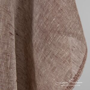 Linen fabric woven in yellowish white and brown colors, melange