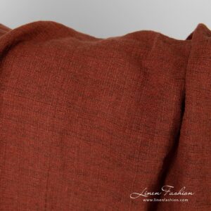Red linen fabric in tweed pattern