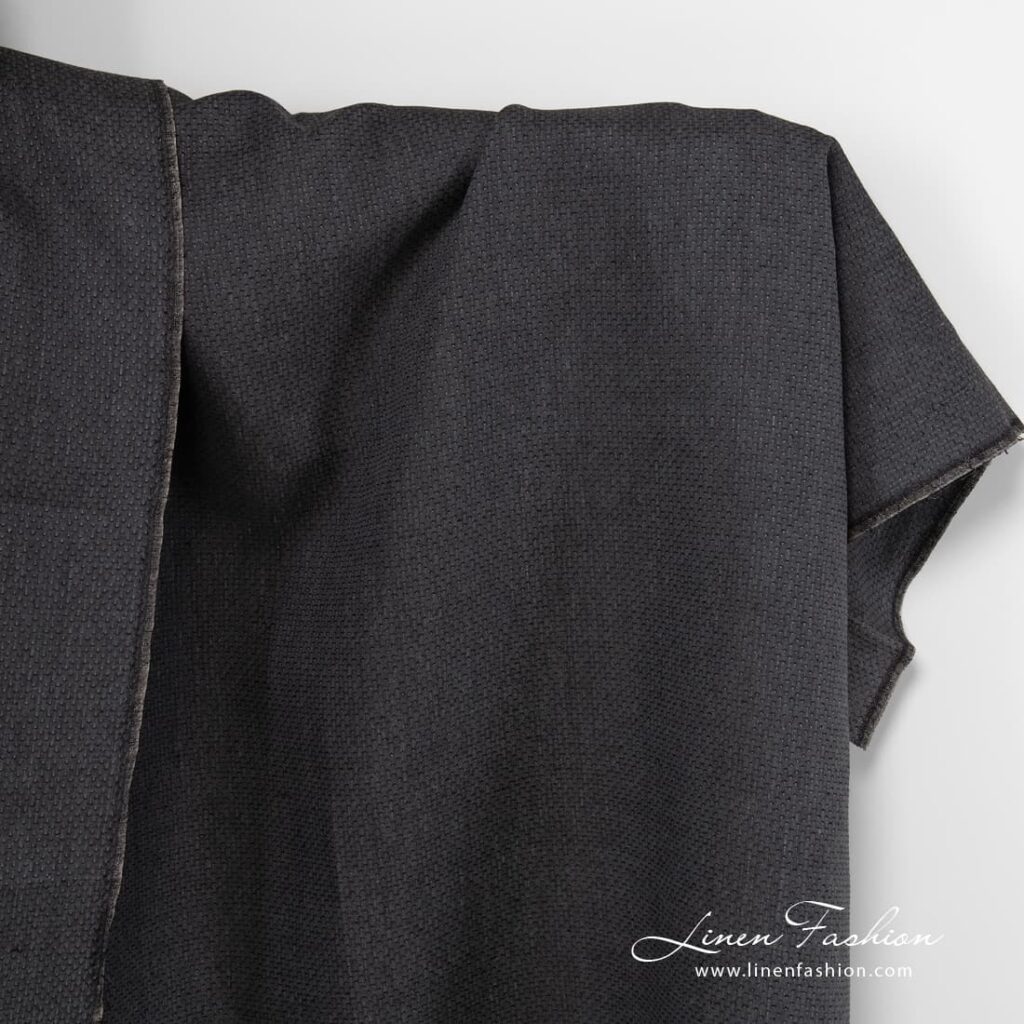 Black patterned linen fabric.