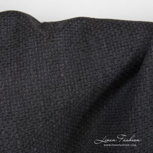 Black 100% linen fabric, patterned.