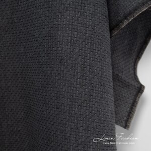 Patterned 100% linen fabric in black.