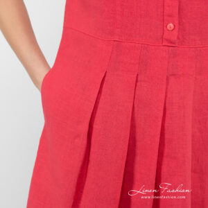 raspberry linen dress with folds and pockets.