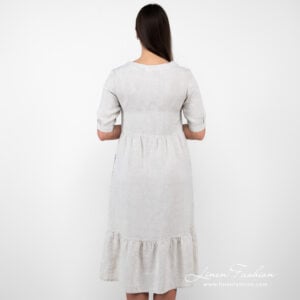 beige long linen dress from backside.