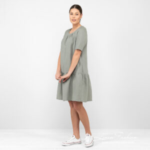 linen wide green dress from side.