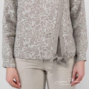 linen cotton beige jacquard blouse with ribbon at bottom.