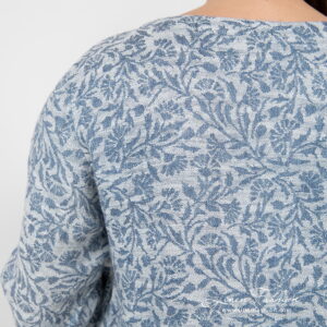 Linen cotton blue flower blouse fragment from back.