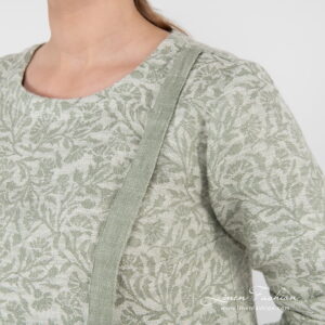 green flower blouse with rounded neck.