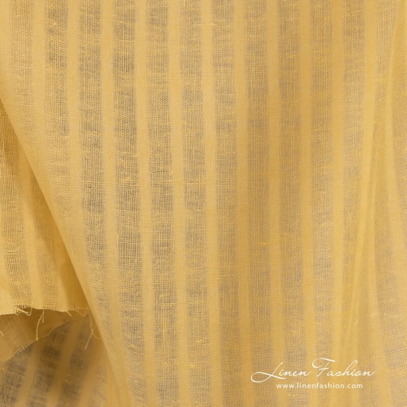 Gulstripet lett linstoff 7 Striped 100% linen fabric in yellow colour.